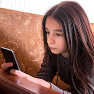 What is cyberbullying and what are the warning signs?
